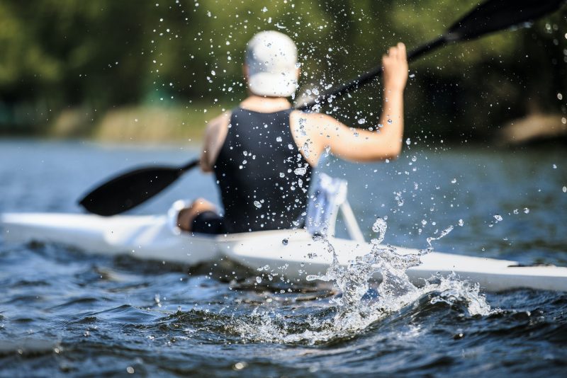 Athlete Rowing Kayak